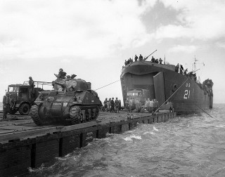 Unloading British Tanks and Trucks off Normandy 6 June 1944